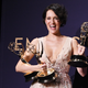 Fleabag creator-star Phoebe Waller-Bridge and three statues she didn’t have to swipe from Godmother